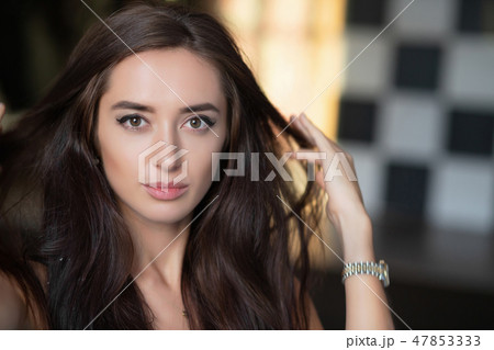 Portrait of a pretty young woman. Portrait of a pretty young woman. 47853333