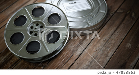 Vintage film reel with filmstrip. Video, cinema Vintage film reel with filmstrip. Video, cinema 47853863