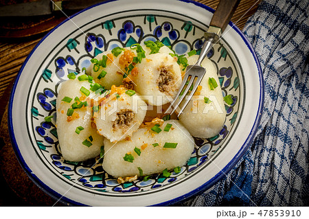 Potato dumplings stuffed with minced meat Potato dumplings stuffed with minced meat 47853910