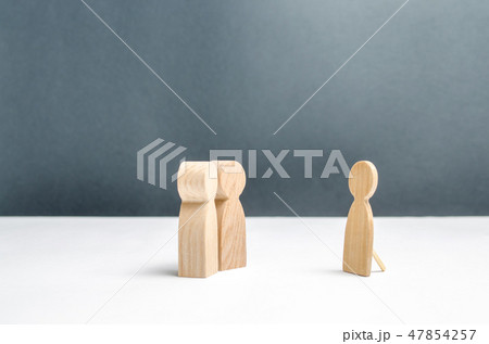 Two human figures look at a false human figure 47854257