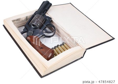 A gun hidden inside a book A gun hidden inside a book 47854827