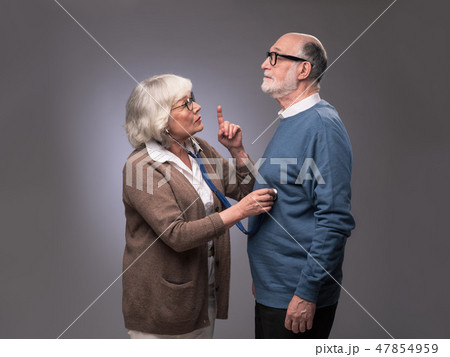 Senior woman checking heart beat Senior woman checking heart beat 47854959