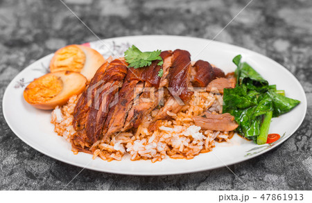 Stewed pork leg on rice with boiled egg, 47861913