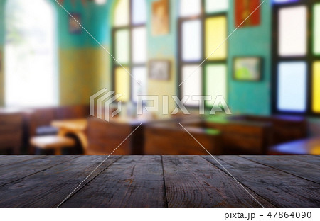 Empty wood table blur cafe restaurant background Empty wood table blur cafe restaurant background 47864090