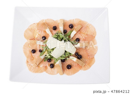 Appetizer of salmon and currants with arugula. 47864212