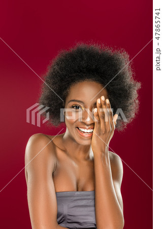 Cheerful Afro American woman feeling very happy 47865741