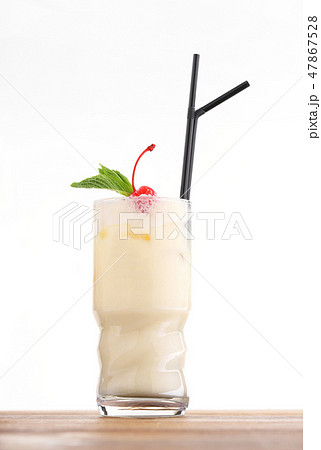 Cold alcohol cocktail with milk 47867528