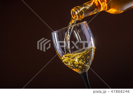 white wine pouring glass white wine pouring glass 47868246
