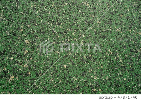 Green nonstick stone crumb background. Green nonstick stone crumb background. 47871740