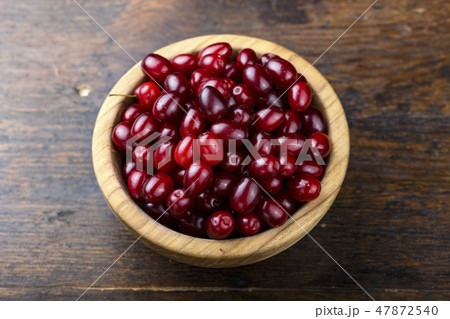 fresh barberry berries in a plate 47872540