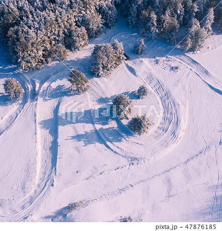 Aerial view of the winter snow covered forest Aerial view of the winter snow covered forest 47876185