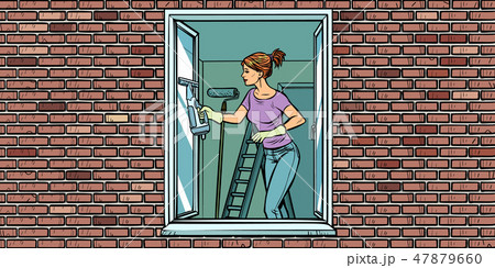 woman washes a window, home cleaning 47879660