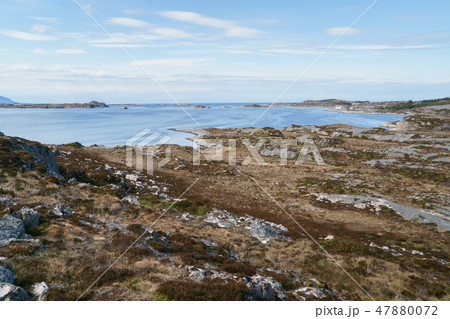 Rocky coast and Atlantic ocean, Beautiful landscape near Atlantic road in Norway in bright spring Rocky coast and Atlantic ocean, Beautiful landscape near Atlantic road in Norway in bright spring 47880072