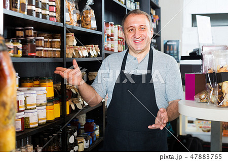 man standing near counter 47883765