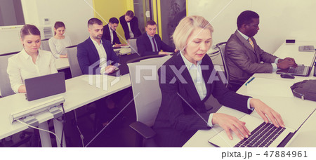Business people working in coworking space Business people working in coworking space 47884961