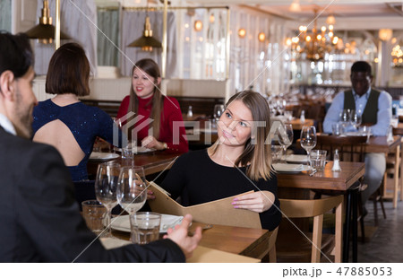 Lovely couple is dining together Lovely couple is dining together 47885053