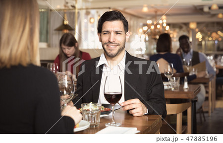 Portrait of couple who is dining and drinking wine 47885196