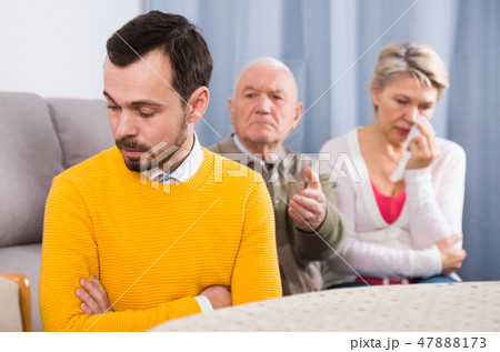 Grandfather teaches grandson Grandfather teaches grandson 47888173