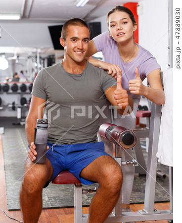 Man and woman posing at gym 47889030