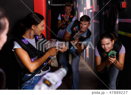 Jolly young girls took aim with laser guns 47889227