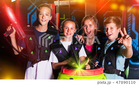 Teen kids with laser guns Teen kids with laser guns 47890110