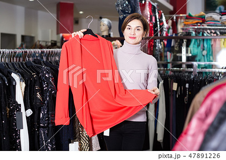 Woman showing a stylish cardigan 47891226