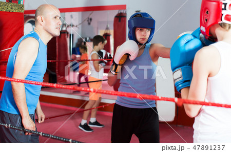 Boxer sparring on the ring 47891237
