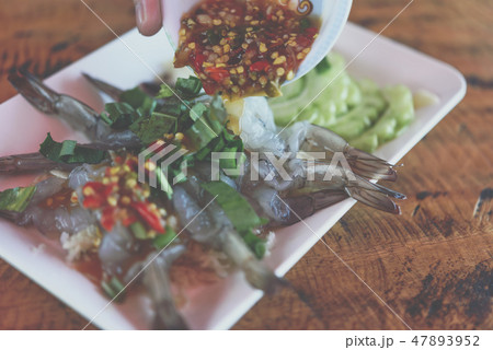 Shrimp in fish sauce at Thai seafood market Shrimp in fish sauce at Thai seafood market 47893952