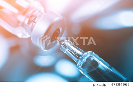Vaccine vial dose flu shot drug needle syringe. Vaccine vial dose flu shot drug needle syringe. 47894965
