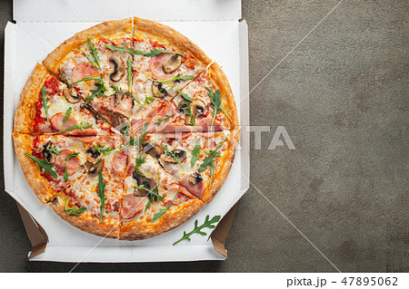 Italian fast food. Delicious hot pizza in a box 47895062