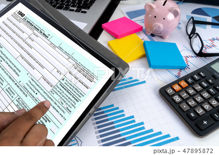 Businessman and partner using calculator Money Businessman and partner using calculator Money 47895872