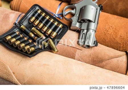 Revolver handgun with ammunition bullet 47896604