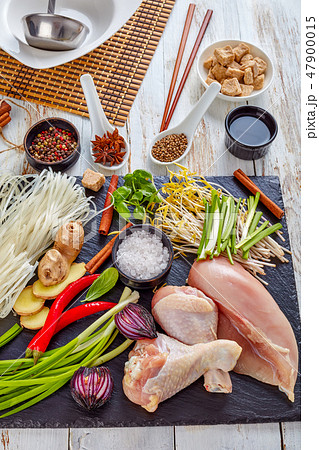 raw ingredients for asian chicken soup, top view 47900015