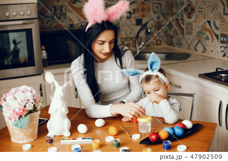 Mother with little son in a kitchen 47902509