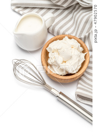 Traditional Mascarpone cheese and cream or milk isolated Traditional Mascarpone cheese and cream or milk isolated 47902570