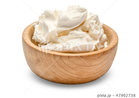 Traditional Mascarpone cheese in wooden bowl isolated with clipping path Traditional Mascarpone cheese in wooden bowl isolated with clipping path 47902738