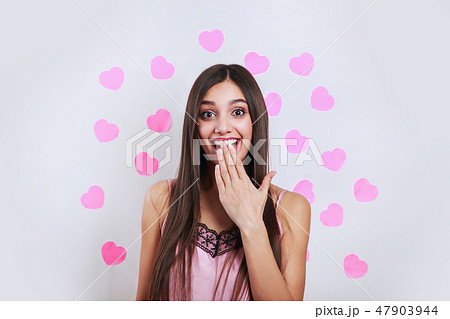 Beautiful brunette woman surprise s . Expressive facial expressions. Valentines day love concept 47903944