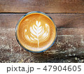 Cup of coffee on the table with Rosetta latte art. 47904605