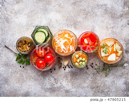 Fermented food. Preserved vegetables in jars Fermented food. Preserved vegetables in jars 47905215