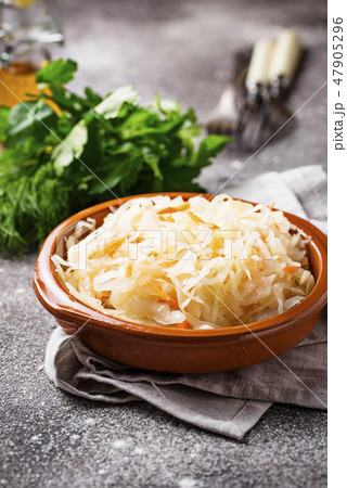 Homemade sauerkraut or pickled cabbage 47905296