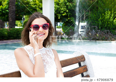 Young woman talking on the phone  47906879