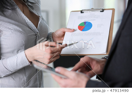 businessmen study documents at office businessmen study documents at office 47913490