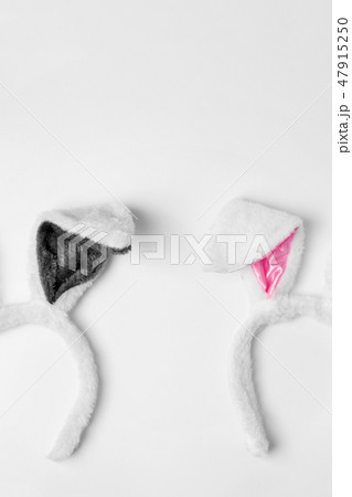 Top view of two rabbit ears on white background pink and couple love holiday easter concept copy 47915250
