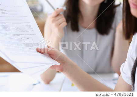 Group of people deliberate on problem with 47921621