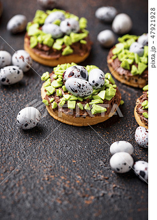 Easter  cookies in shape of nest with eggs 47921928