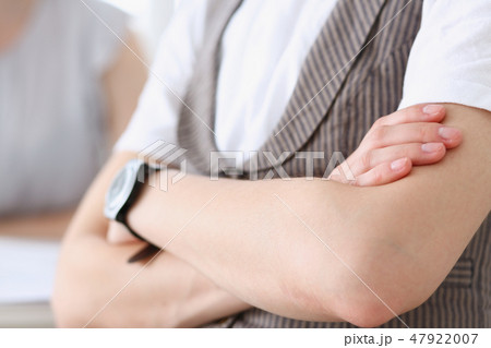 Beautiful girl at workplace with ars crossed 47922007