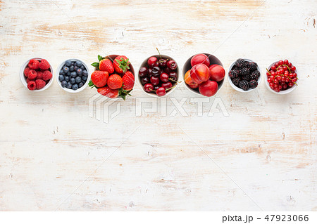 Mixed berries in bowls 47923066