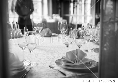 Tables set for an event party or wedding reception. 47923979