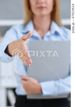Businesswoman offer hand to shake as hello in office 47924624