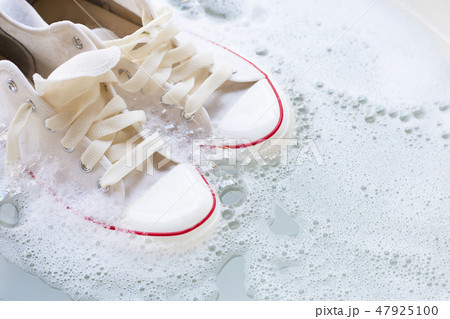 Soak shoes before washing. Dirty sneakers. Soak shoes before washing. Dirty sneakers. 47925100